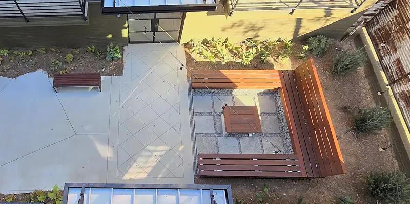 Courtyard with custom wood benches