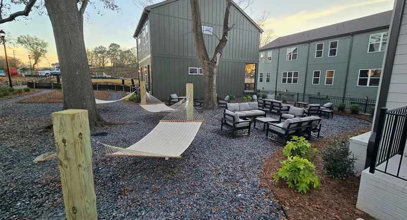 Courtyard with hammocks, gravel & plantings
